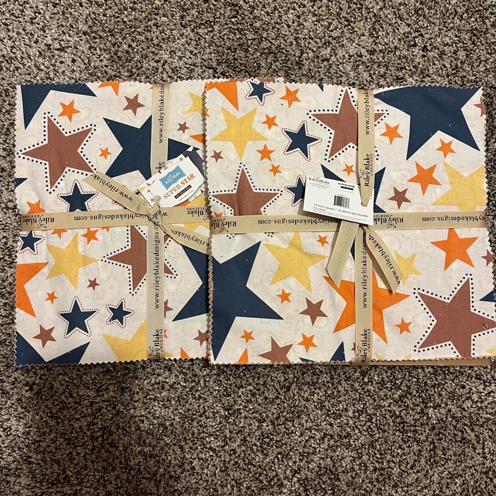 2 Riley Blake Super Star 10” Layer Cakes. 44 pieces total
